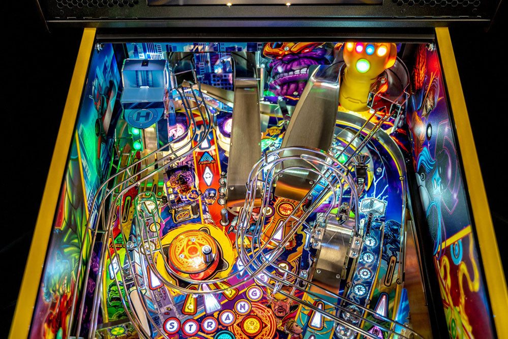 Colorful pinball machine with vibrant lights and details