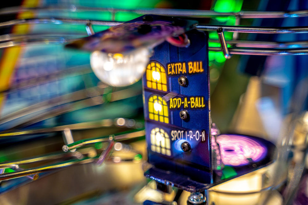Pinball machine with a 'Extra Ball' and 'Add-A-Ball' button panel.