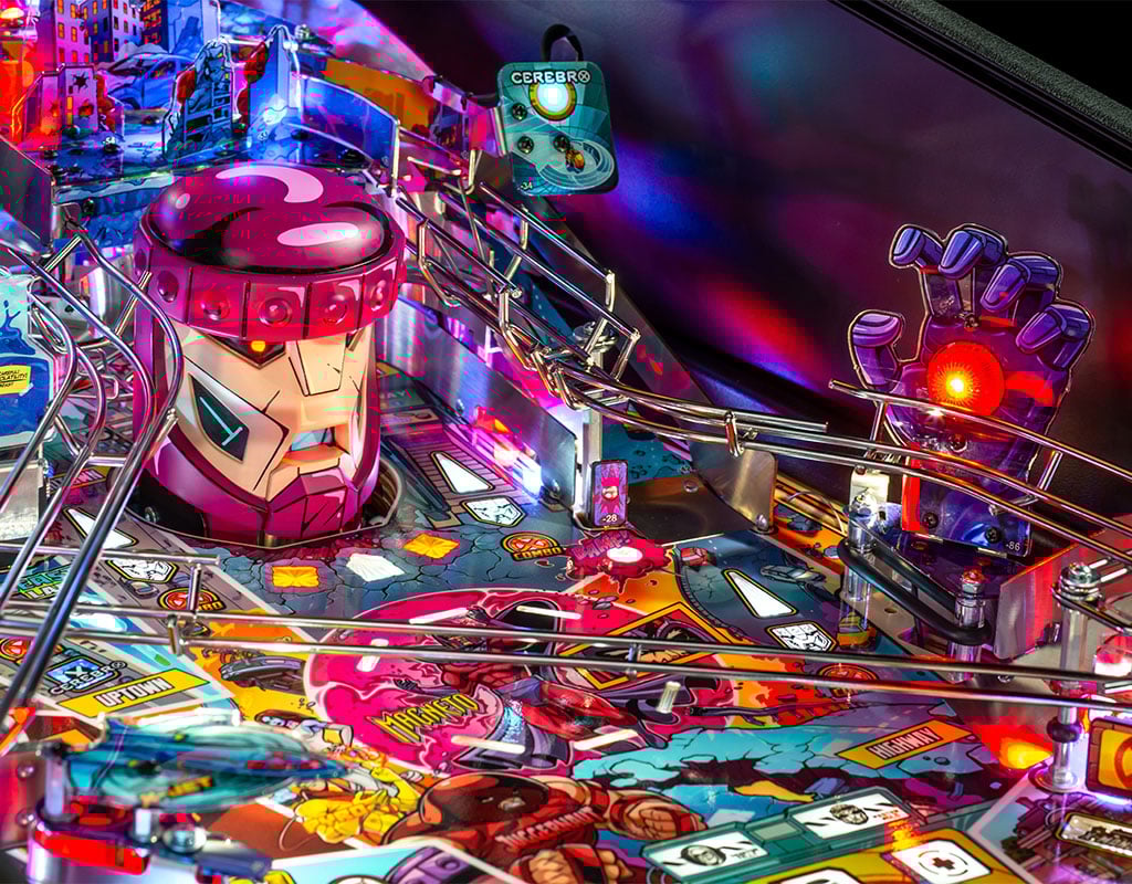 Close-up of a colourful pinball machine with vibrant lights and details.