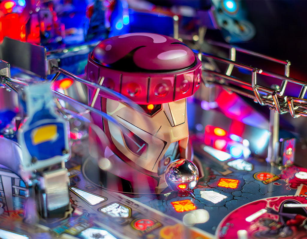 Close-up of a pinball machine with vibrant colours and detailed X-Men design.