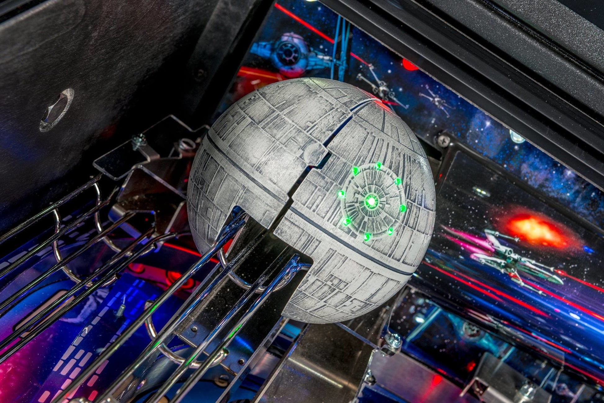 Model of the Death Star with a space-themed background