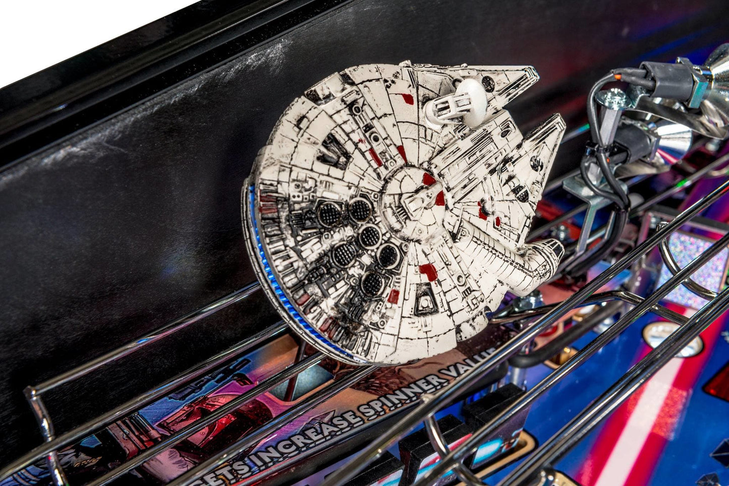 Millennium Falcon model inside the premium pinball machine with colorful background