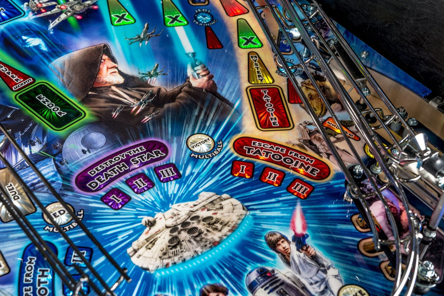Pinball machine with Star Wars-themed artwork featuring characters and iconic elements.