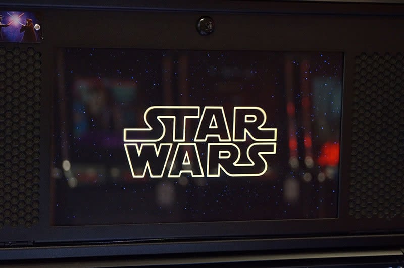 Star Wars logo on a dark background with space theme