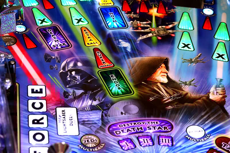 Star Wars-themed pinball machine with characters and text