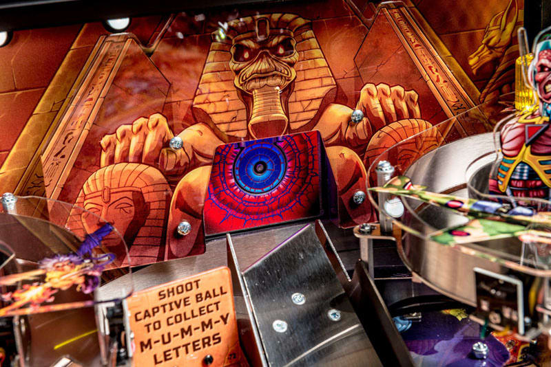 Pinball machine with Egyptian-themed artwork and vibrant colors