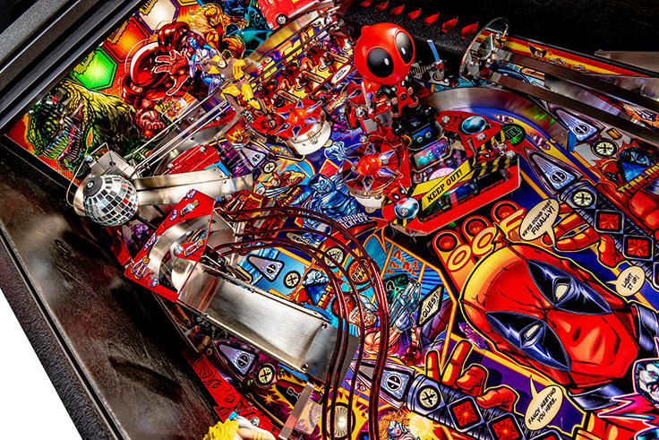 Colorful pinball machine with various deadpool characters and vibrant design