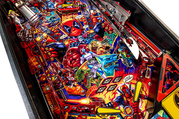 Colorful pinball machine with various characters and vibrant design