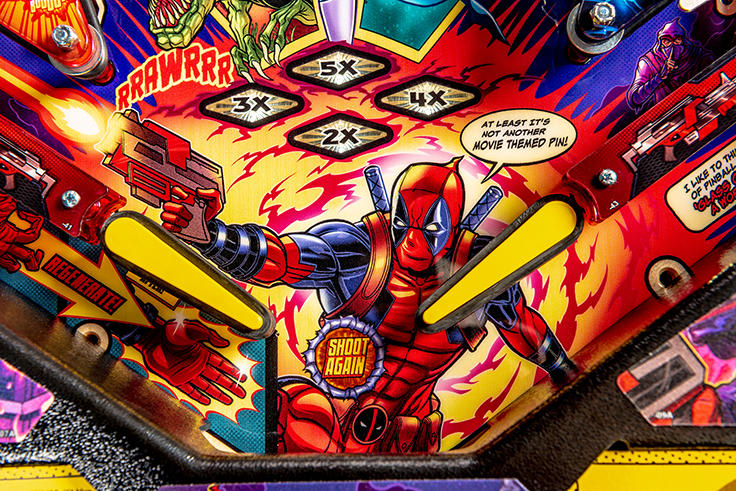 Pinball machine with Deadpool character and colorful design