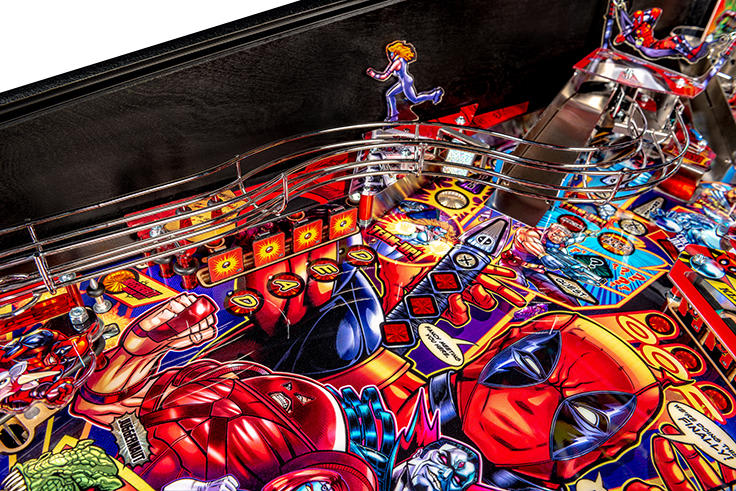 Close-up of a colorful pinball machine with vibrant graphics and characters.
