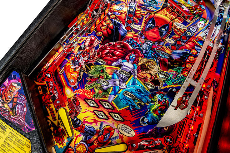 Colorful pinball machine with various characters and vibrant graphics