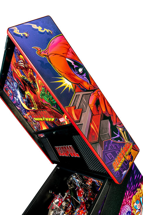 Colorful pinball machine with vibrant graphics on a white background
