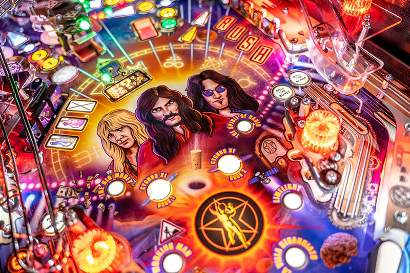 Pinball machine with colourful Rush themed design and characters on a dark background. 
