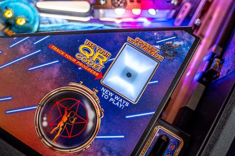 Pinball machine with QR code scanner and promotional text