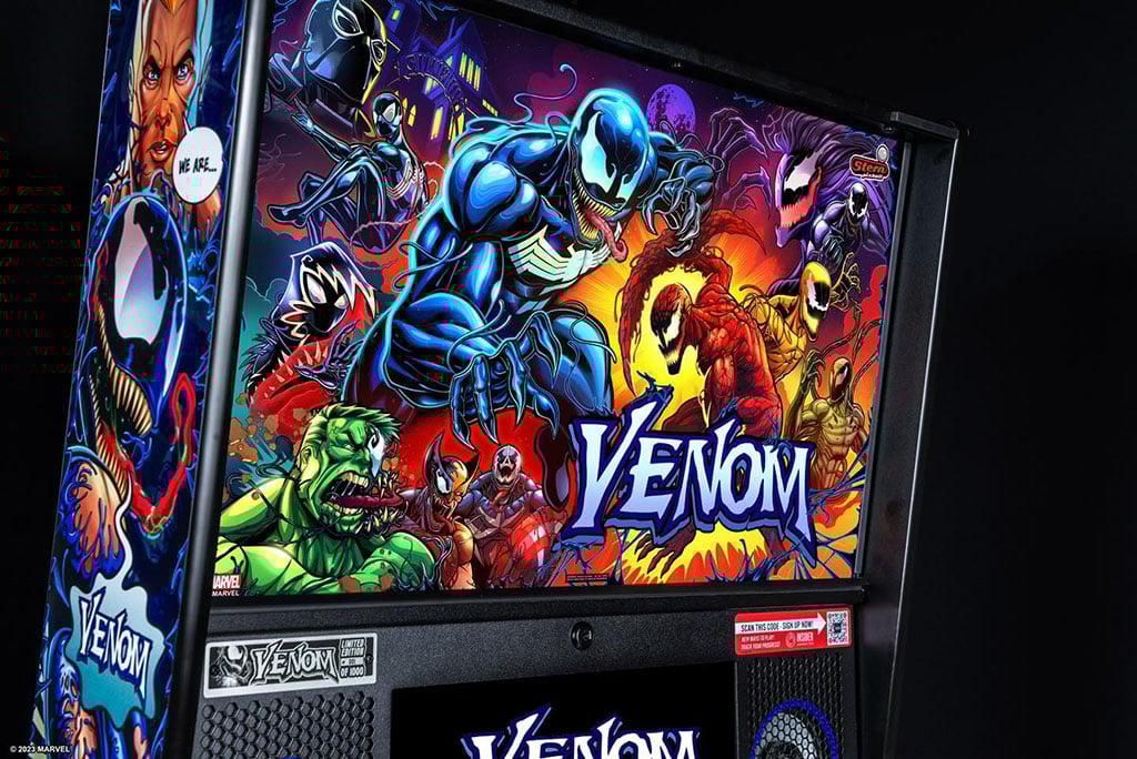 Venom-themed pinball machine with colourful graphics on a dark background