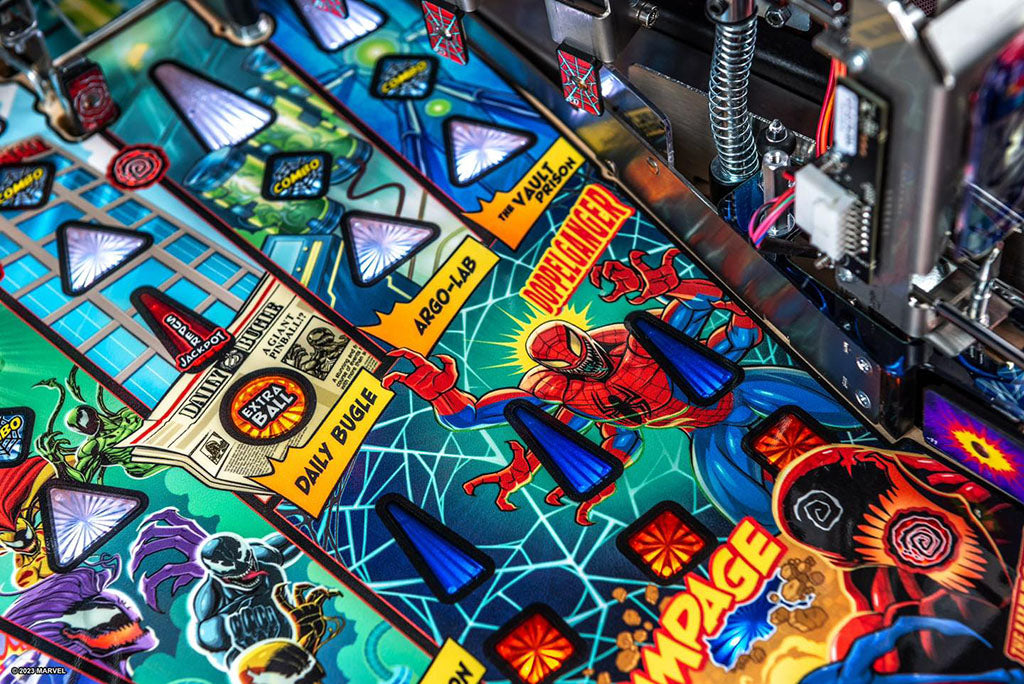 Close-up of a colorful pinball machine with various characters and graphics.