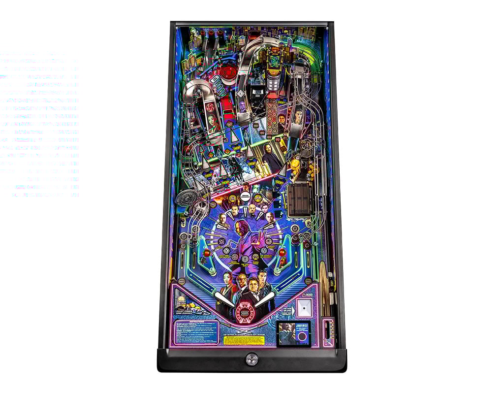 Pinball machine with colourful John Wick themed design on a white background