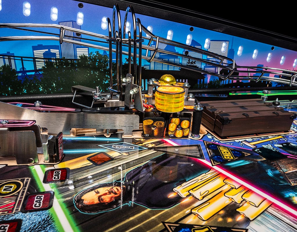 Pinball machine with colourful playfield and urban skyline in the background