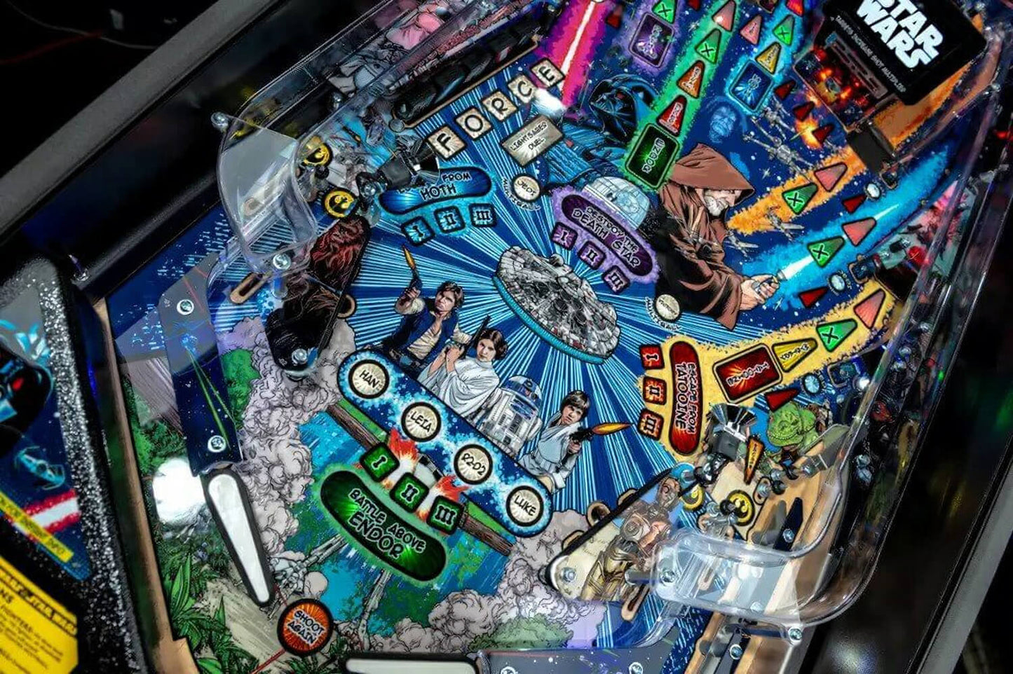 Pinball machine with Star Wars theme featuring characters and iconic elements.
