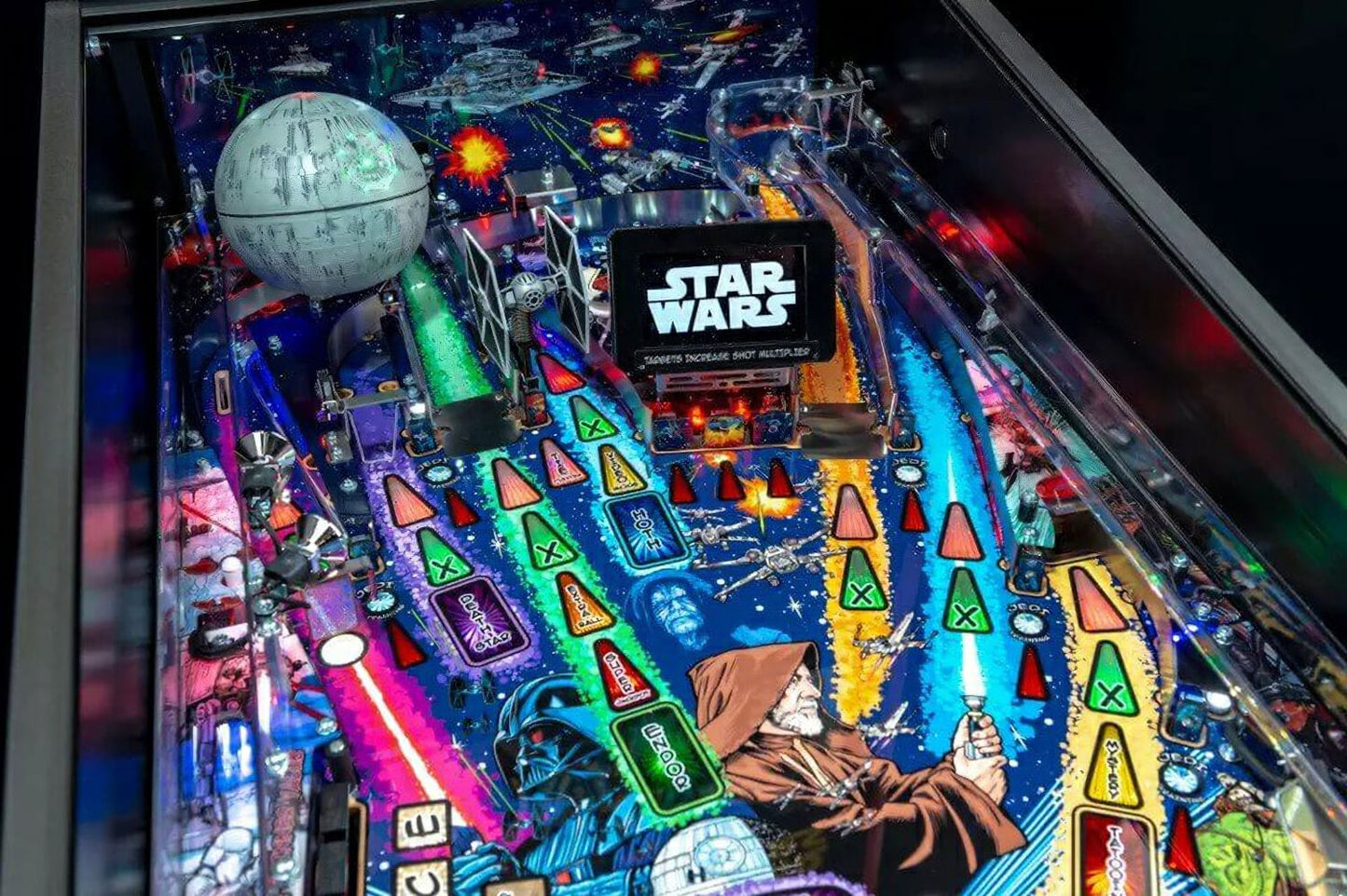 Star Wars pinball machine with colourful lights and characters.