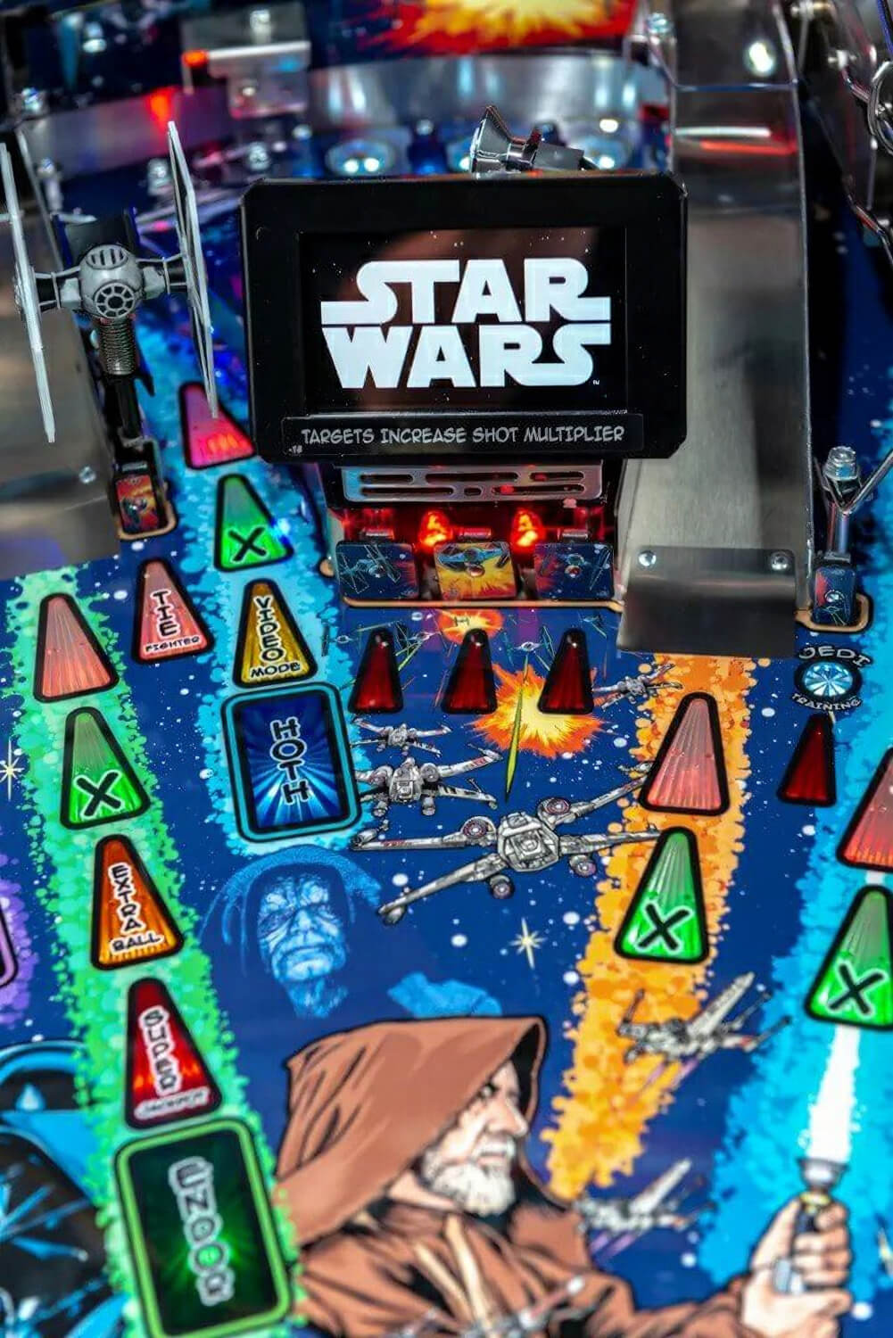 Pinball machine with Star Wars theme, featuring characters and graphics.