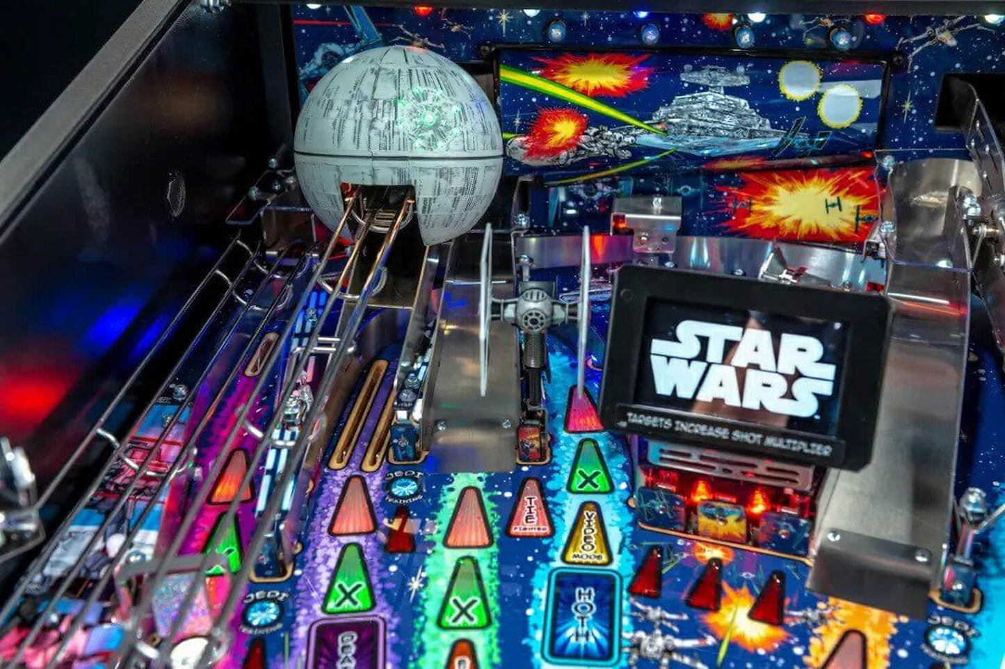 Pinball machine with Star Wars theme featuring the Death Star.