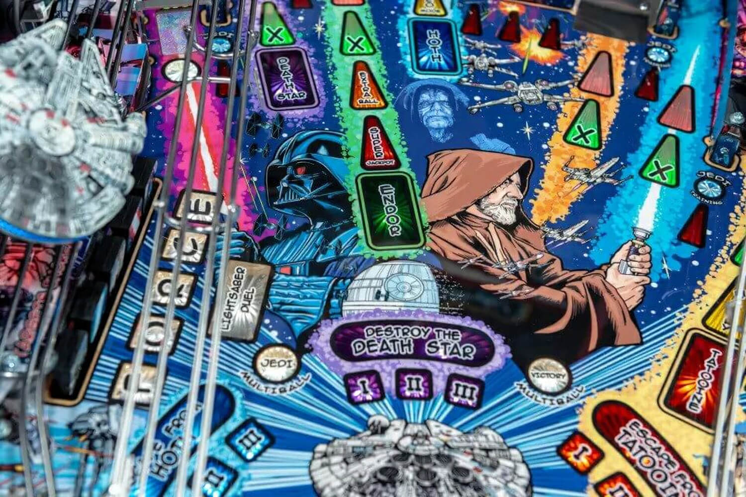 Pinball machine with Star Wars-themed artwork featuring Jedi and Death Star.