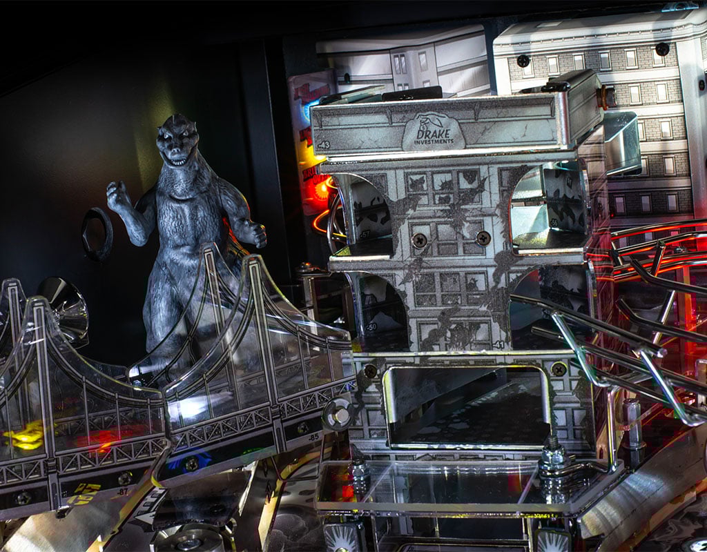 Pinball machine with a figure and various components