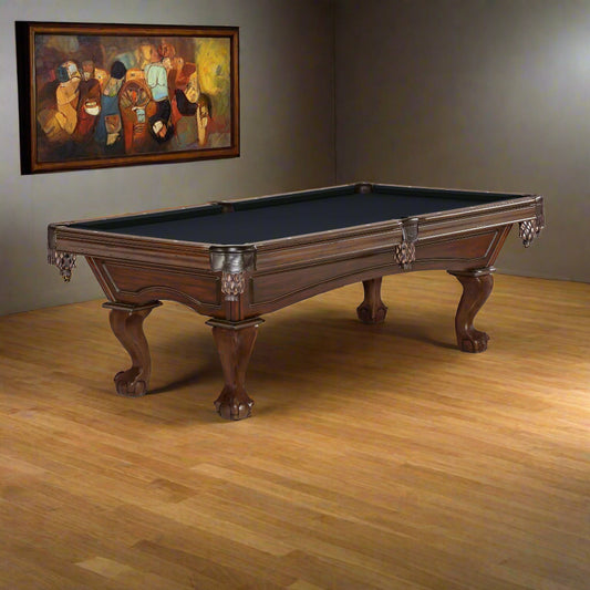 A traditional style Brunswick Glenwood American pool table with ball and claw legs.