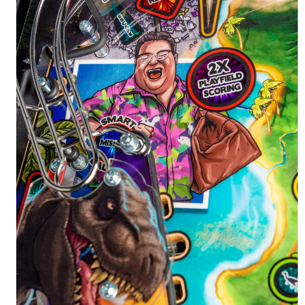 Close-up of a colorful pinball machine with various Jurassic Park elements and a character illustration.