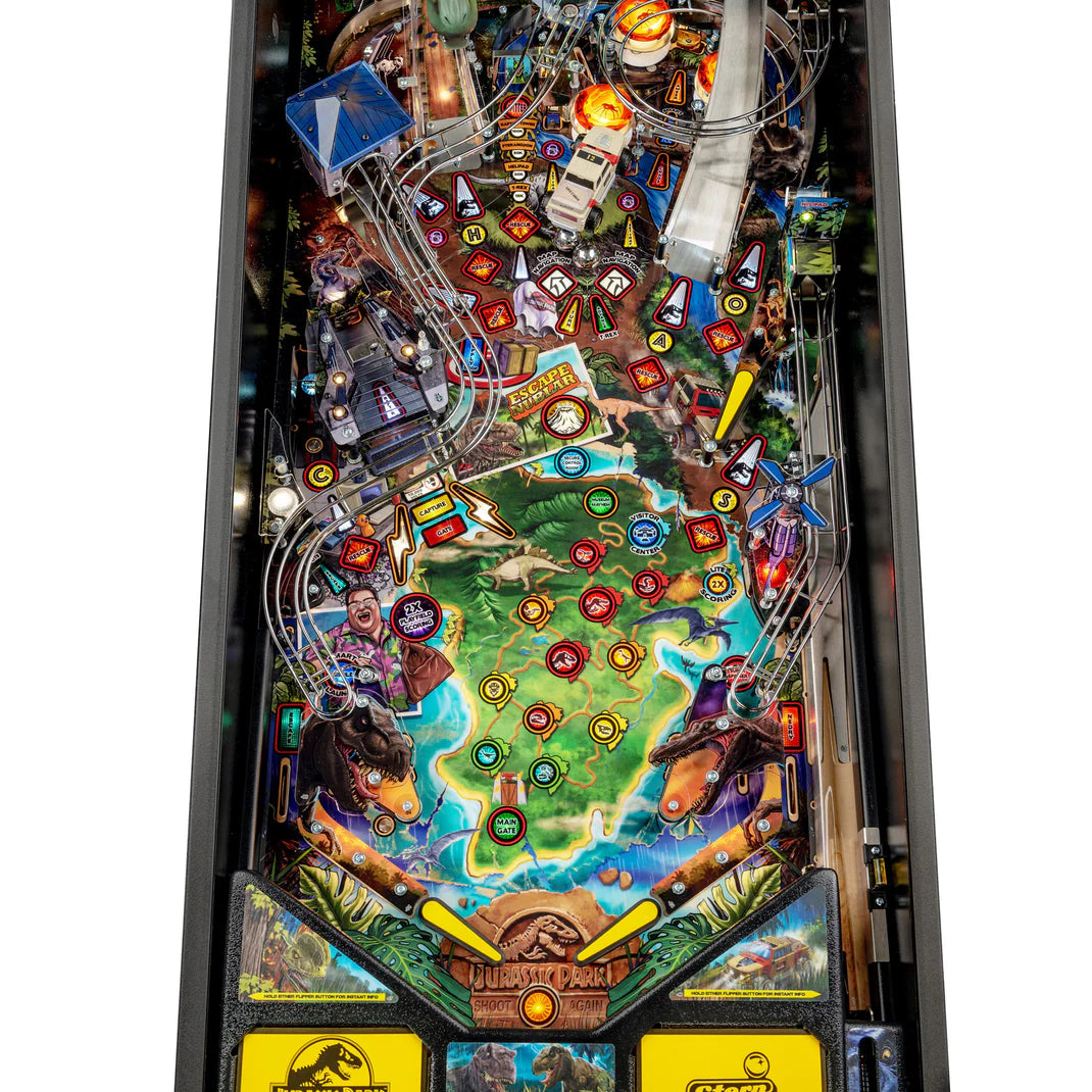 Pinball machine with colorful Jurassic Park design and various elements on a white background